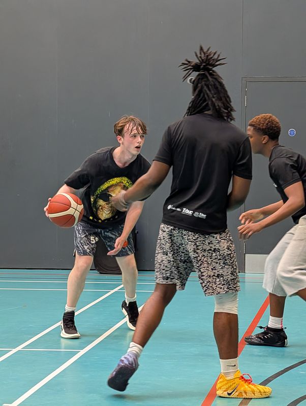 Defenders collapsing on a player driving with the ball
