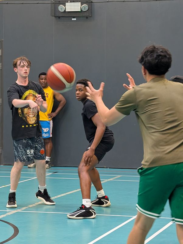 A player catching a pass in traffic